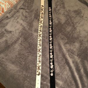 Two women’s size large belts
